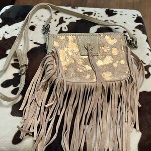 cowhide acid wash cross body bag